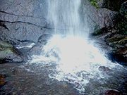 looking at the base of the beach waterfall with tanna Adventures